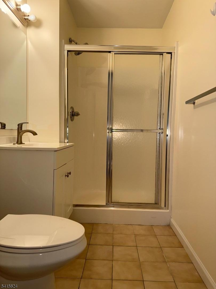 5 Chanda Court, Unit 5 Clifton, NJ 07012 - Photo 14 of 15 a bathroom with a sink toilet and shower