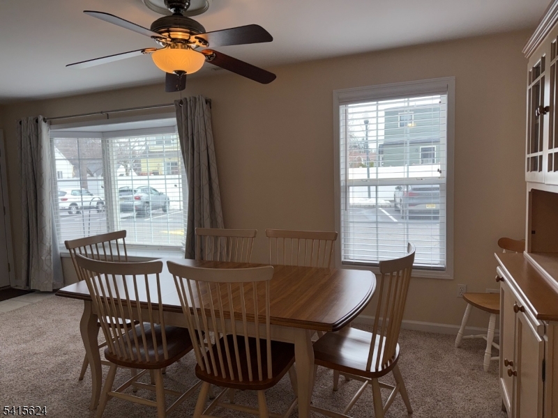 5 Chanda Court, Unit 5 Clifton, NJ 07012 - Photo 4 of 15 a view of a dining room with furniture window and outside view