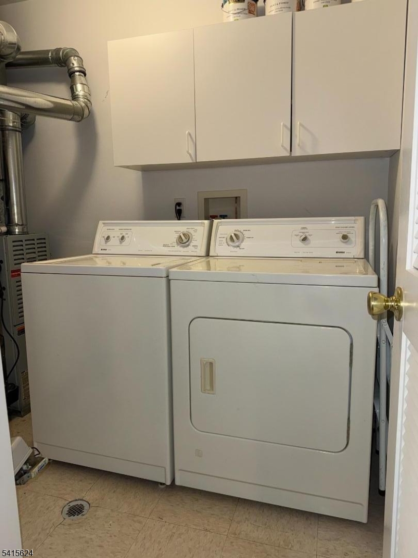 5 Chanda Court, Unit 5 Clifton, NJ 07012 - Photo 6 of 15 a utility room with dryer and washer