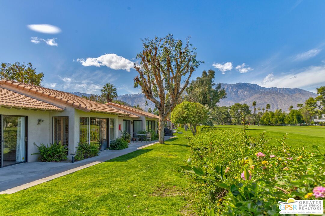 6090 East Driver Road Palm Springs, CA 92264 - Photo 1 of 29 a view of a house with a big yard