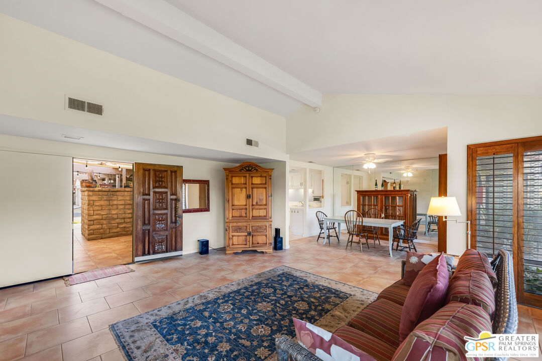 6090 East Driver Road Palm Springs, CA 92264 - Photo 14 of 29 a living room with furniture and a window