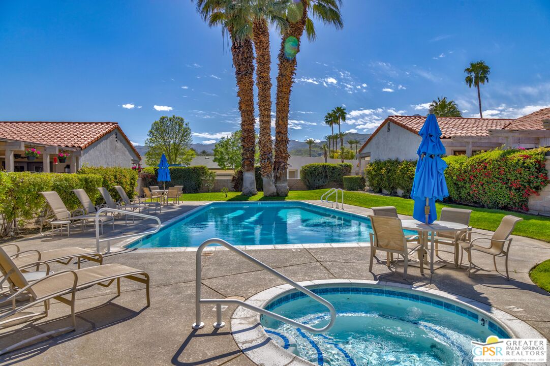 6090 East Driver Road Palm Springs, CA 92264 - Photo 5 of 29 a view of a house with swimming pool and sitting area