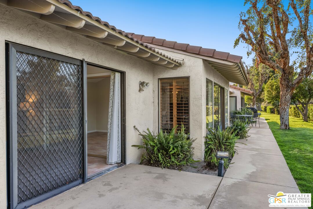 6090 East Driver Road Palm Springs, CA 92264 - Photo 7 of 29 front view of a house with a yard