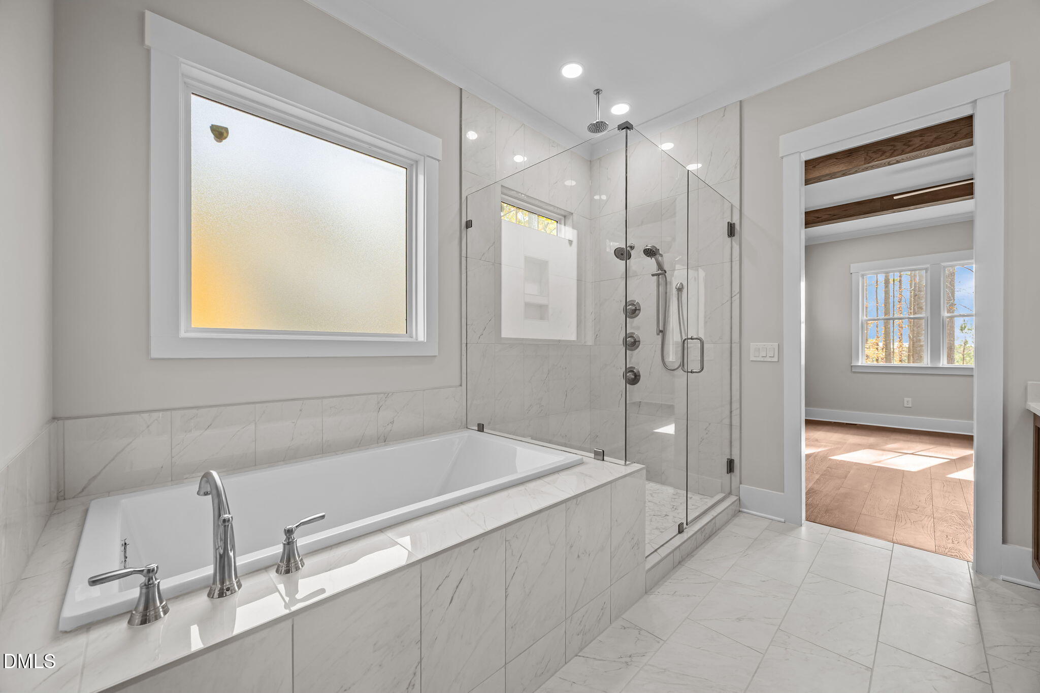 485 Chapel Ridge Drive Pittsboro, NC 27312 - Photo 23 of 74 a spacious bathroom with a tub shower and sink