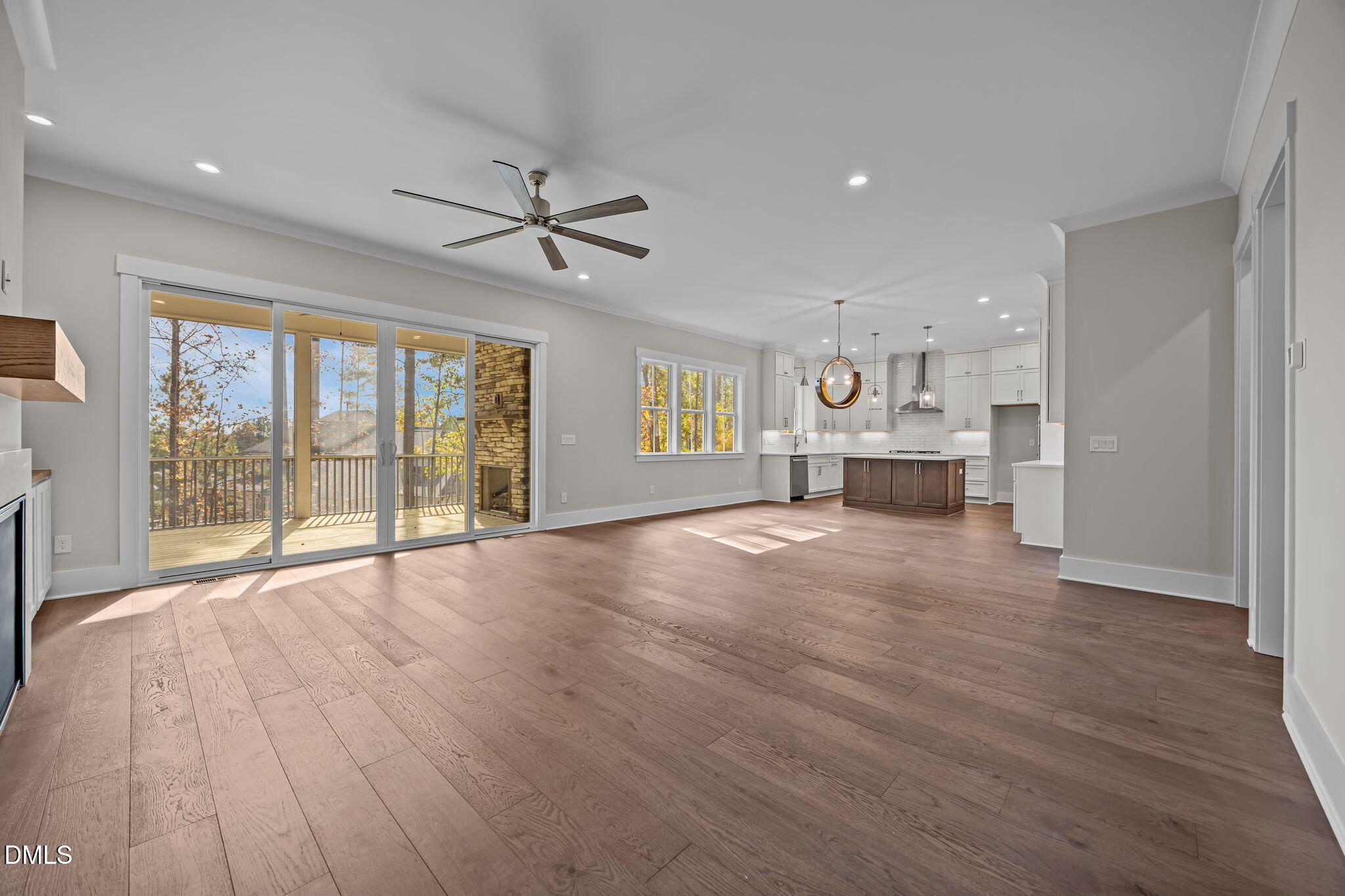 485 Chapel Ridge Drive Pittsboro, NC 27312 - Photo 26 of 74 a view of empty room with wooden floor and fireplace