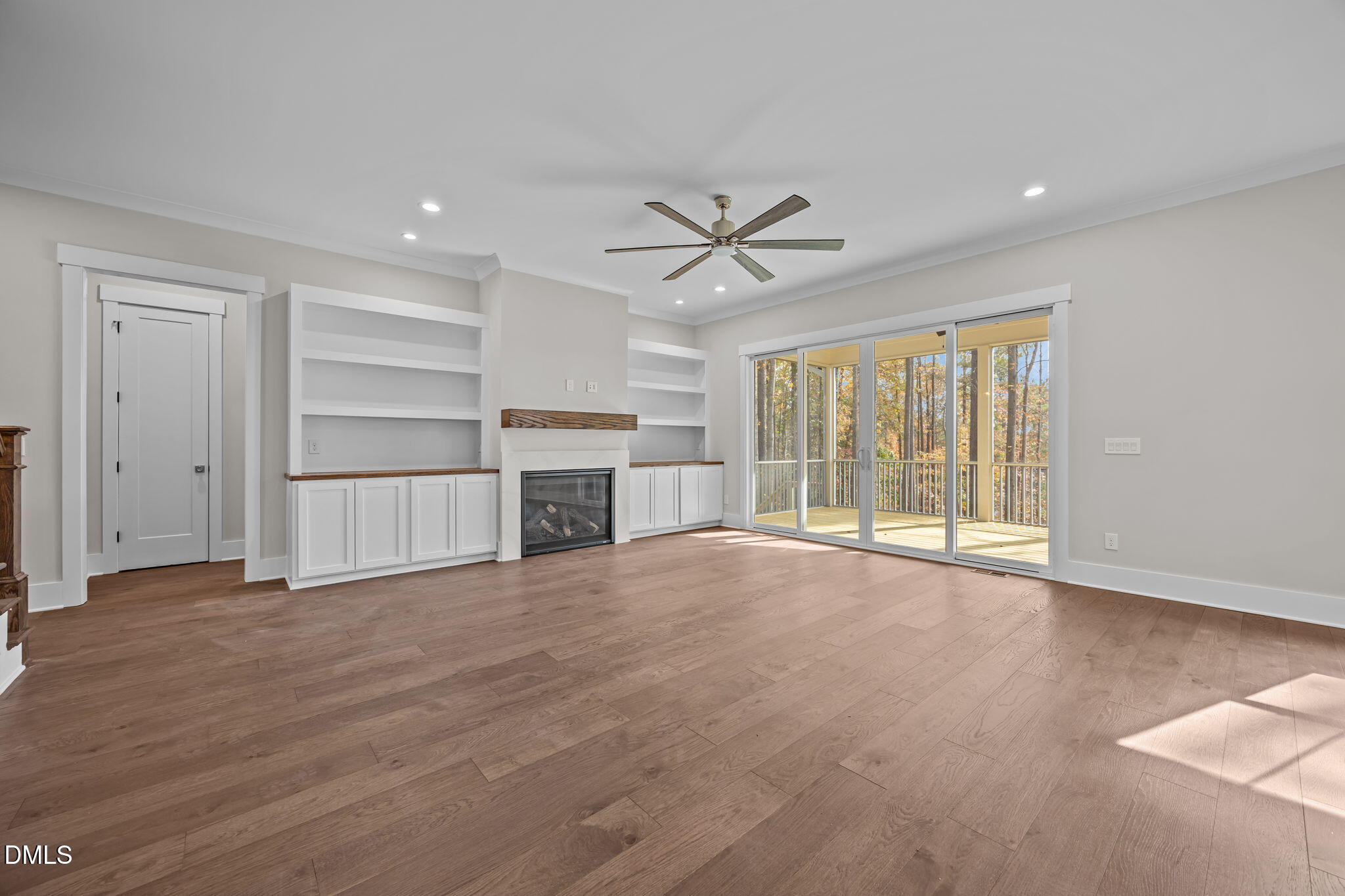 485 Chapel Ridge Drive Pittsboro, NC 27312 - Photo 27 of 74 a view of an empty room with a fireplace and a window