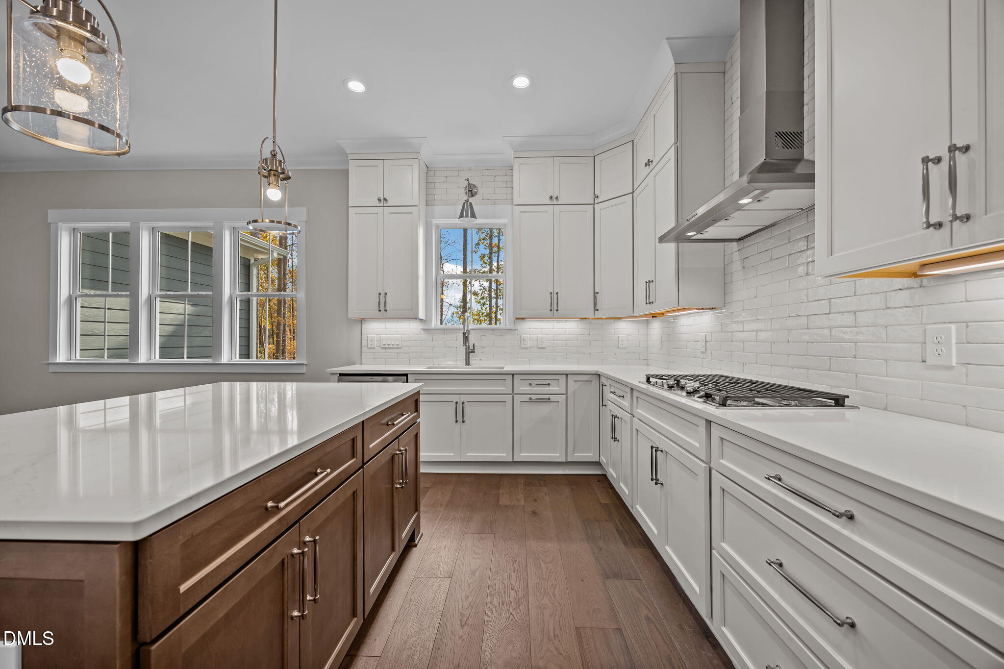485 Chapel Ridge Drive Pittsboro, NC 27312 - Photo 34 of 74 a large kitchen with stainless steel appliances granite countertop a stove and a sink
