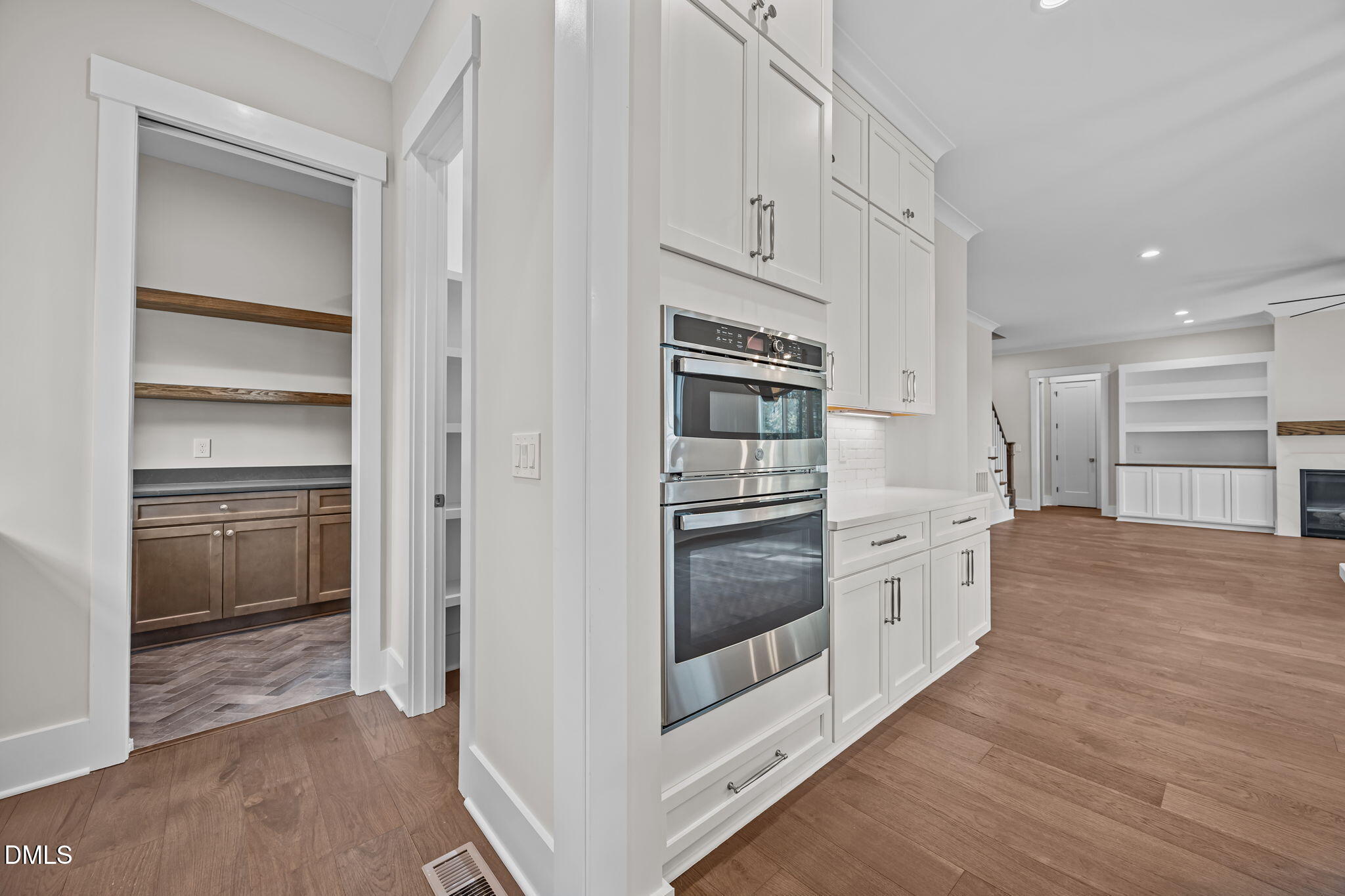 485 Chapel Ridge Drive Pittsboro, NC 27312 - Photo 35 of 74 a kitchen with stainless steel appliances a refrigerator and a stove top oven