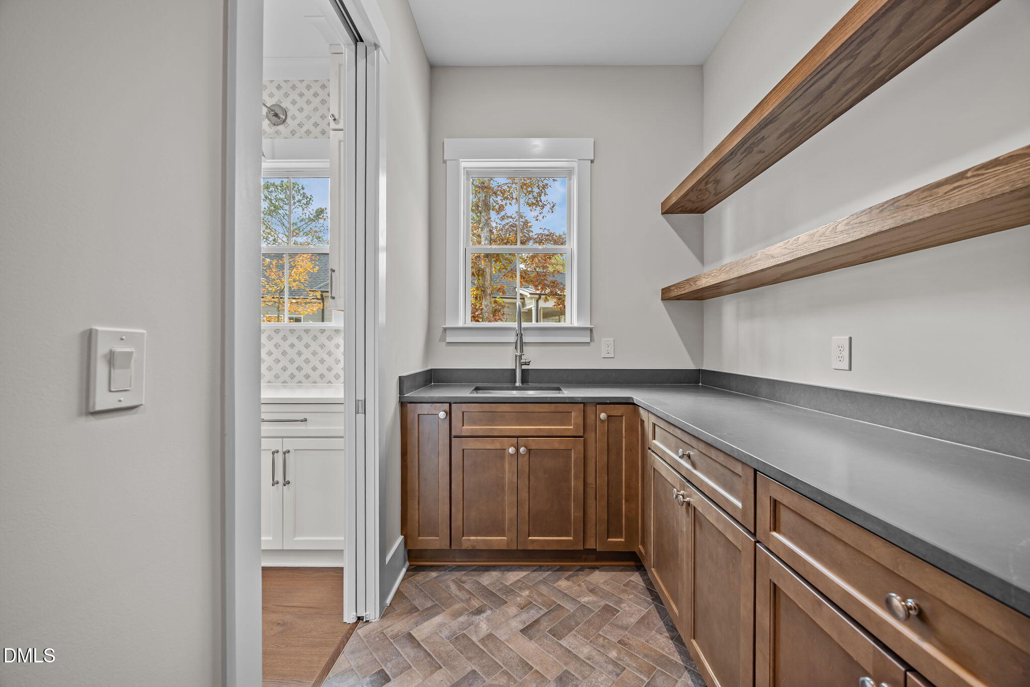485 Chapel Ridge Drive Pittsboro, NC 27312 - Photo 38 of 74 a kitchen with granite countertop a sink and cabinets