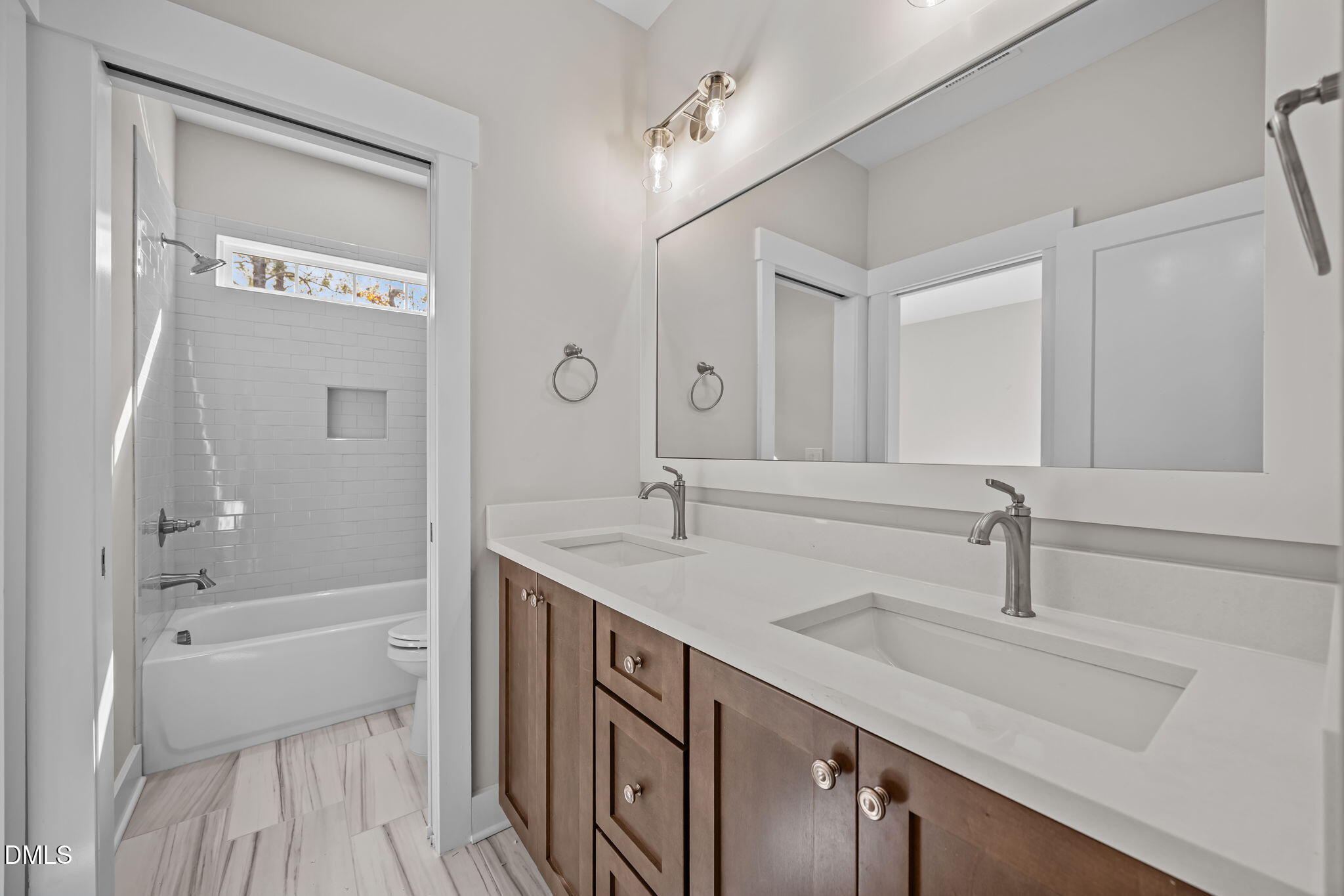 485 Chapel Ridge Drive Pittsboro, NC 27312 - Photo 47 of 74 a bathroom with a sink a toilet and shower