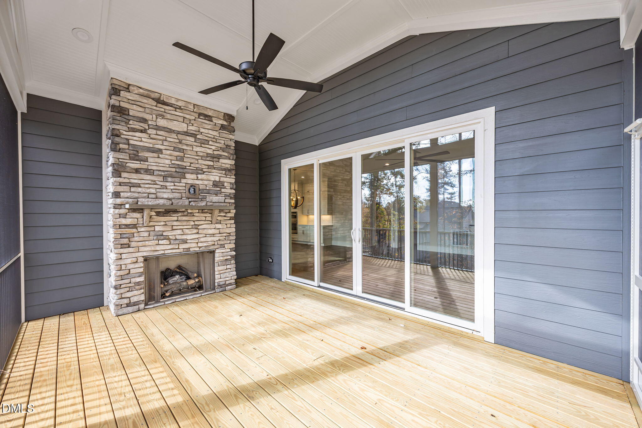 485 Chapel Ridge Drive Pittsboro, NC 27312 - Photo 55 of 74 a view of an empty room with a fireplace and a window
