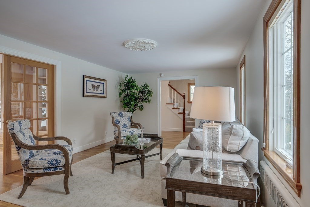 244 Independence Road Concord, MA 01742 - Photo 4 of 37 a living room with furniture and wooden floor