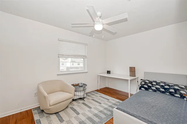 a bathroom with a sink a mirror a toilet and a shower