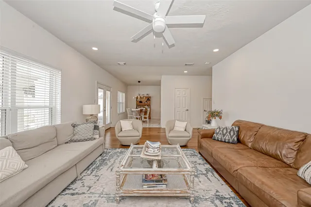 a kitchen with stainless steel appliances granite countertop a sink and a stove