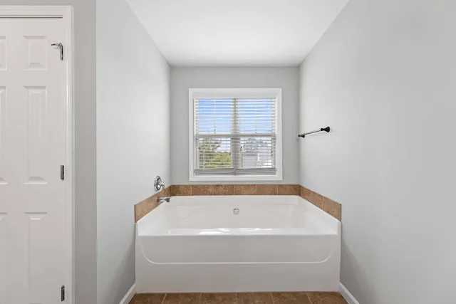 a bathroom with a bathtub