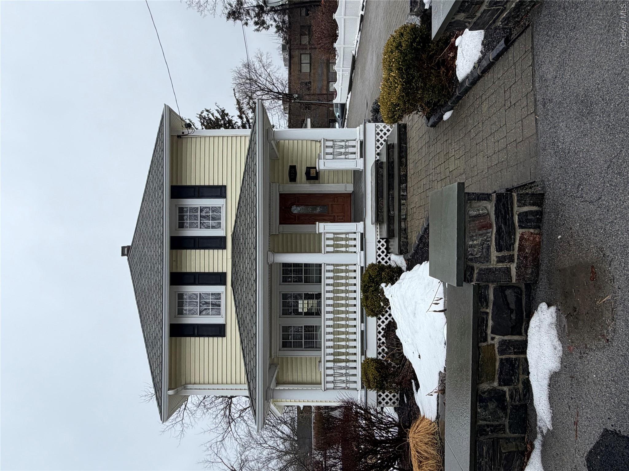 1230 Hopewell Avenue Fishkill, NY 12524 - Photo 1 of 16 a front view of a house with a yard