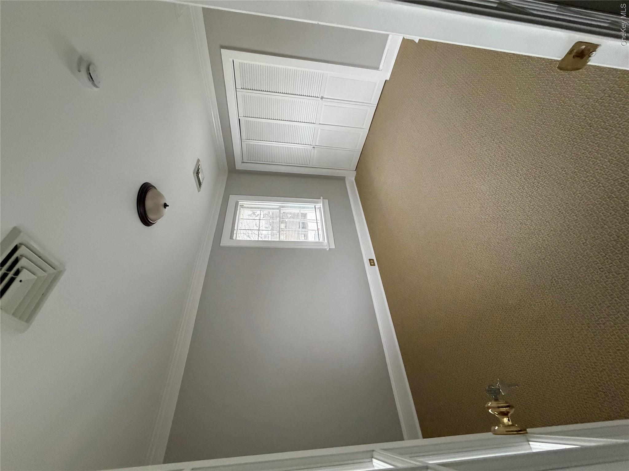 1230 Hopewell Avenue Fishkill, NY 12524 - Photo 12 of 16 an empty room with windows