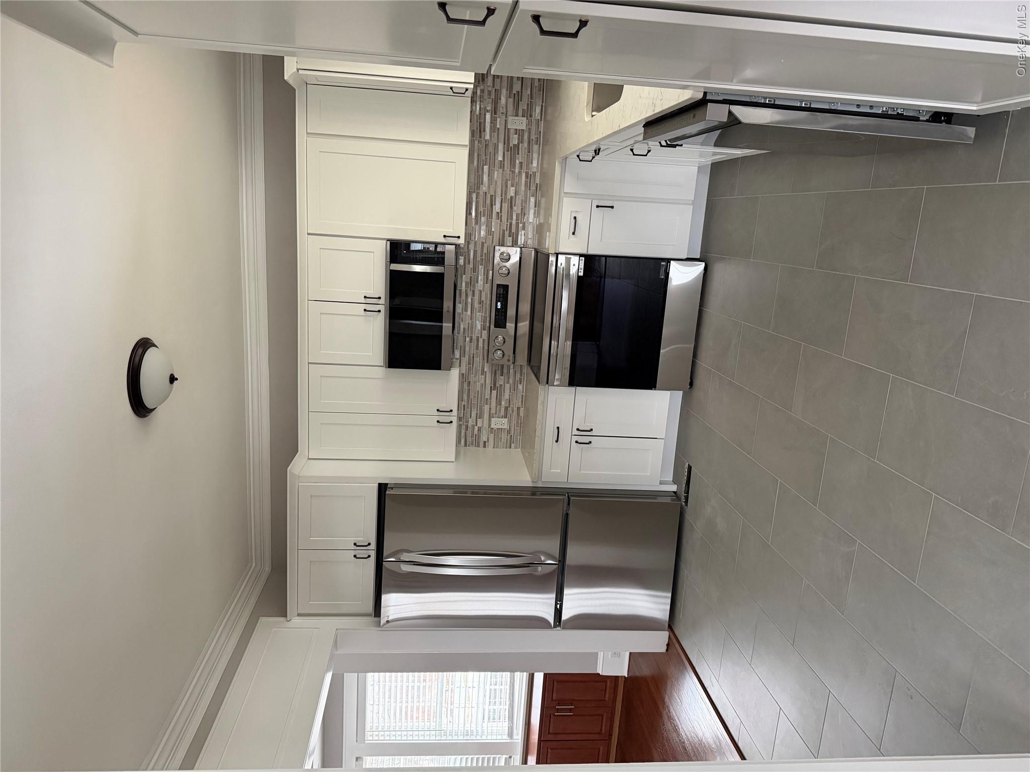 1230 Hopewell Avenue Fishkill, NY 12524 - Photo 3 of 16 a kitchen with stainless steel appliances granite countertop a refrigerator stove a sink and dishwasher