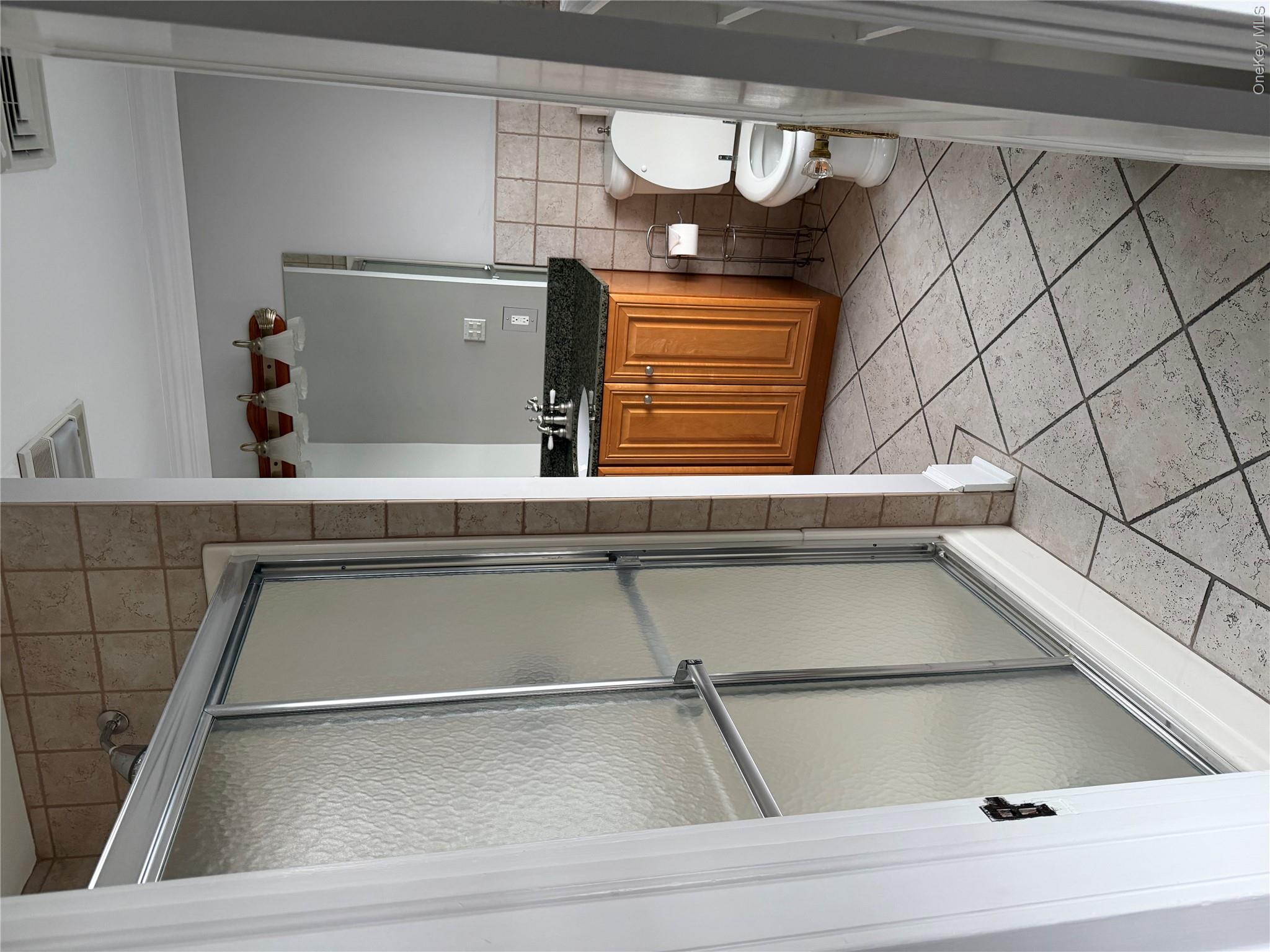 1230 Hopewell Avenue Fishkill, NY 12524 - Photo 9 of 16 a bathroom with a sink toilet and shower