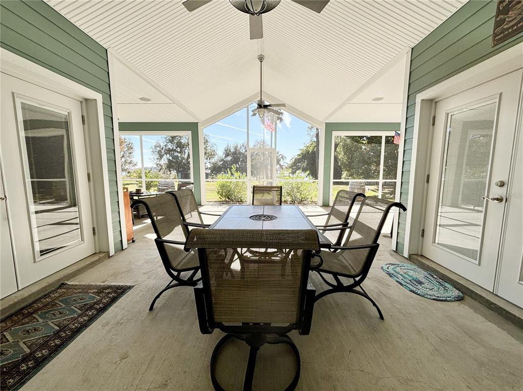19151 Southeast 135th Court Dunnellon, FL 34431 - Photo 13 of 65 a view of a dining room with furniture window and outside view
