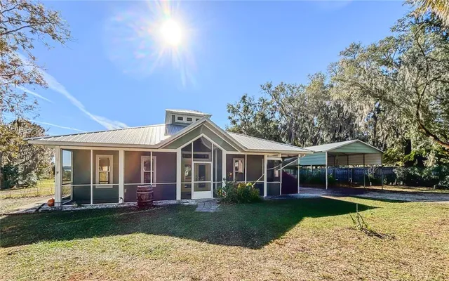 a view of house with outdoor space
