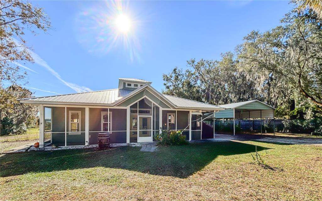 19151 Southeast 135th Court Dunnellon, FL 34431 - Photo 3 of 65 a view of house with outdoor space