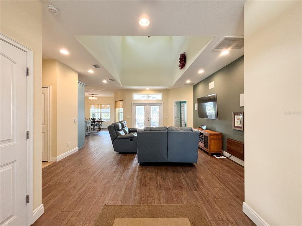 19151 Southeast 135th Court Dunnellon, FL 34431 - Photo 37 of 65 a living room with furniture and a wooden floor