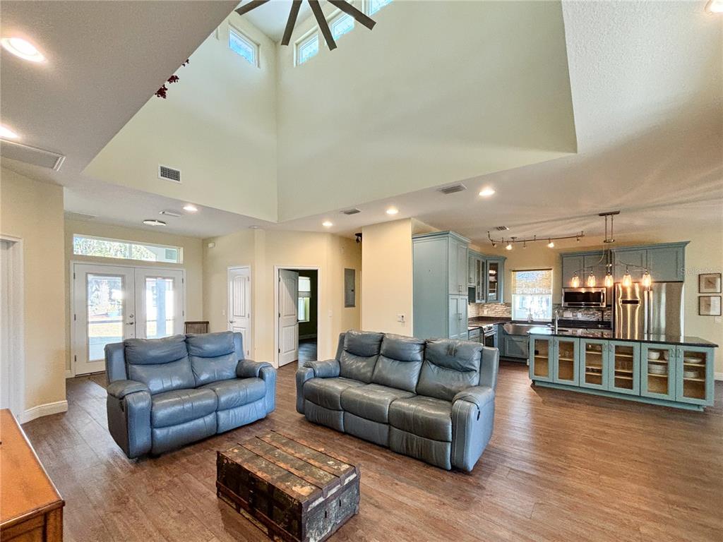 19151 Southeast 135th Court Dunnellon, FL 34431 - Photo 39 of 65 a living room with furniture and wooden floor
