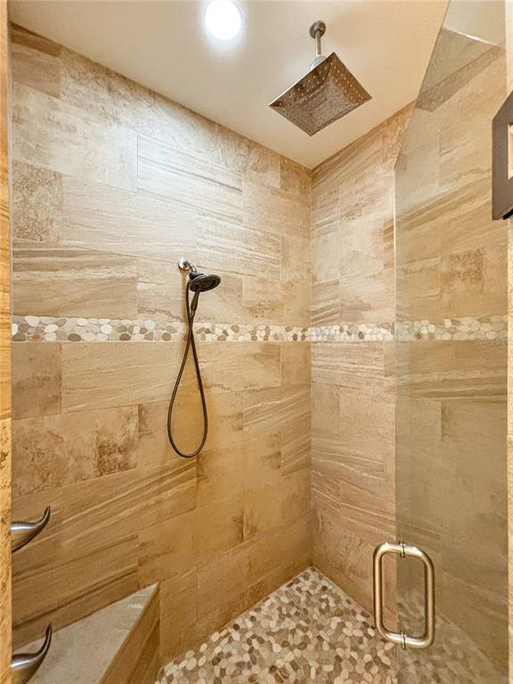 19151 Southeast 135th Court Dunnellon, FL 34431 - Photo 47 of 65 a bathroom with a shower