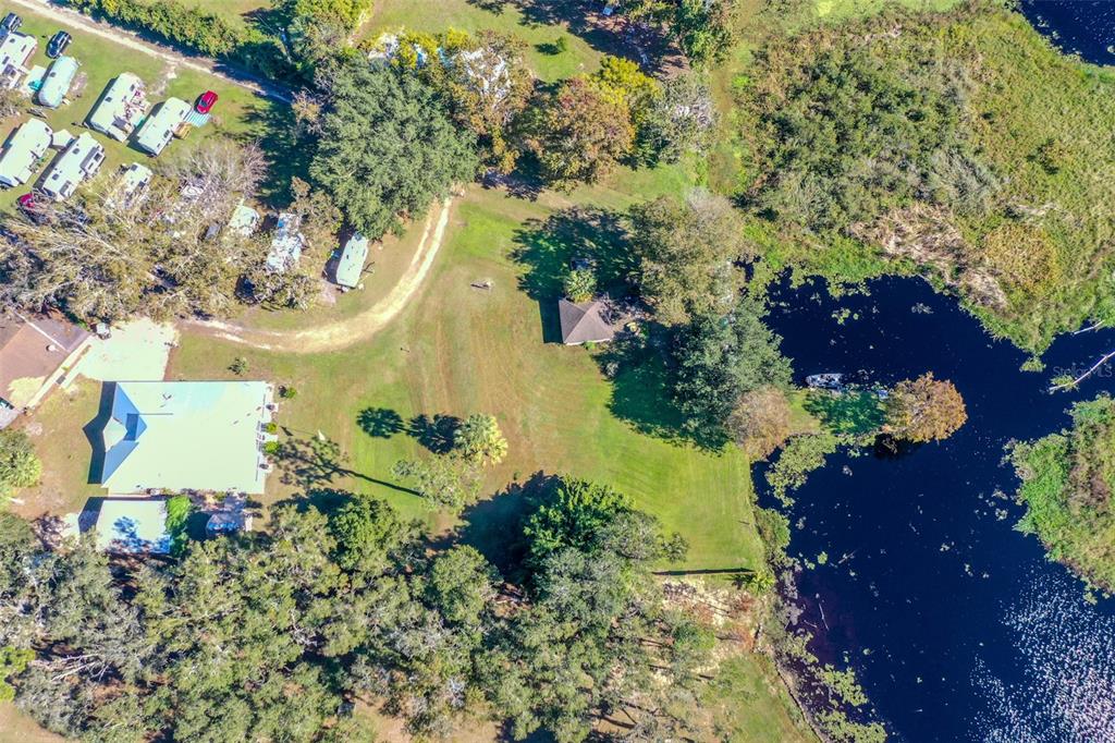 19151 Southeast 135th Court Dunnellon, FL 34431 - Photo 53 of 65 a view of a garden with a flower garden