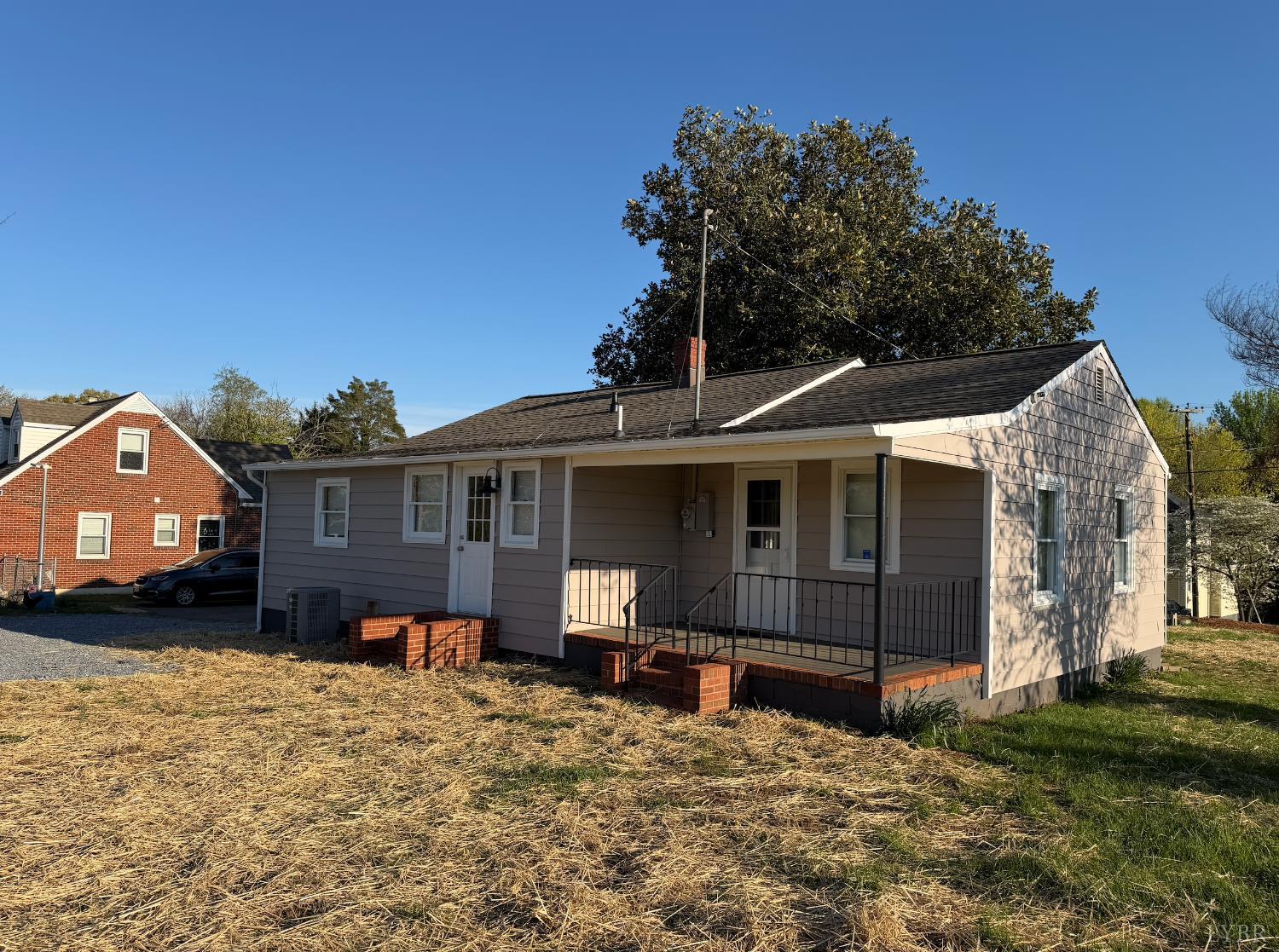 127 Campbell Street Madison Heights, VA 24572 - Photo 19 of 28 a front view of a house with a yard