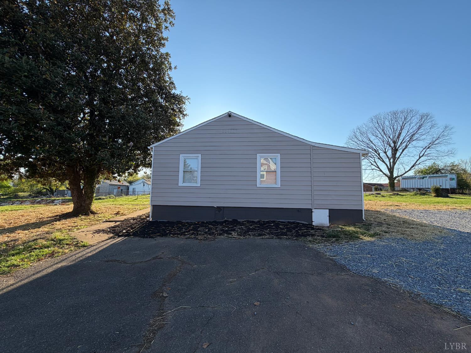 127 Campbell Street Madison Heights, VA 24572 - Photo 28 of 28 a view of a house with backyard and trees