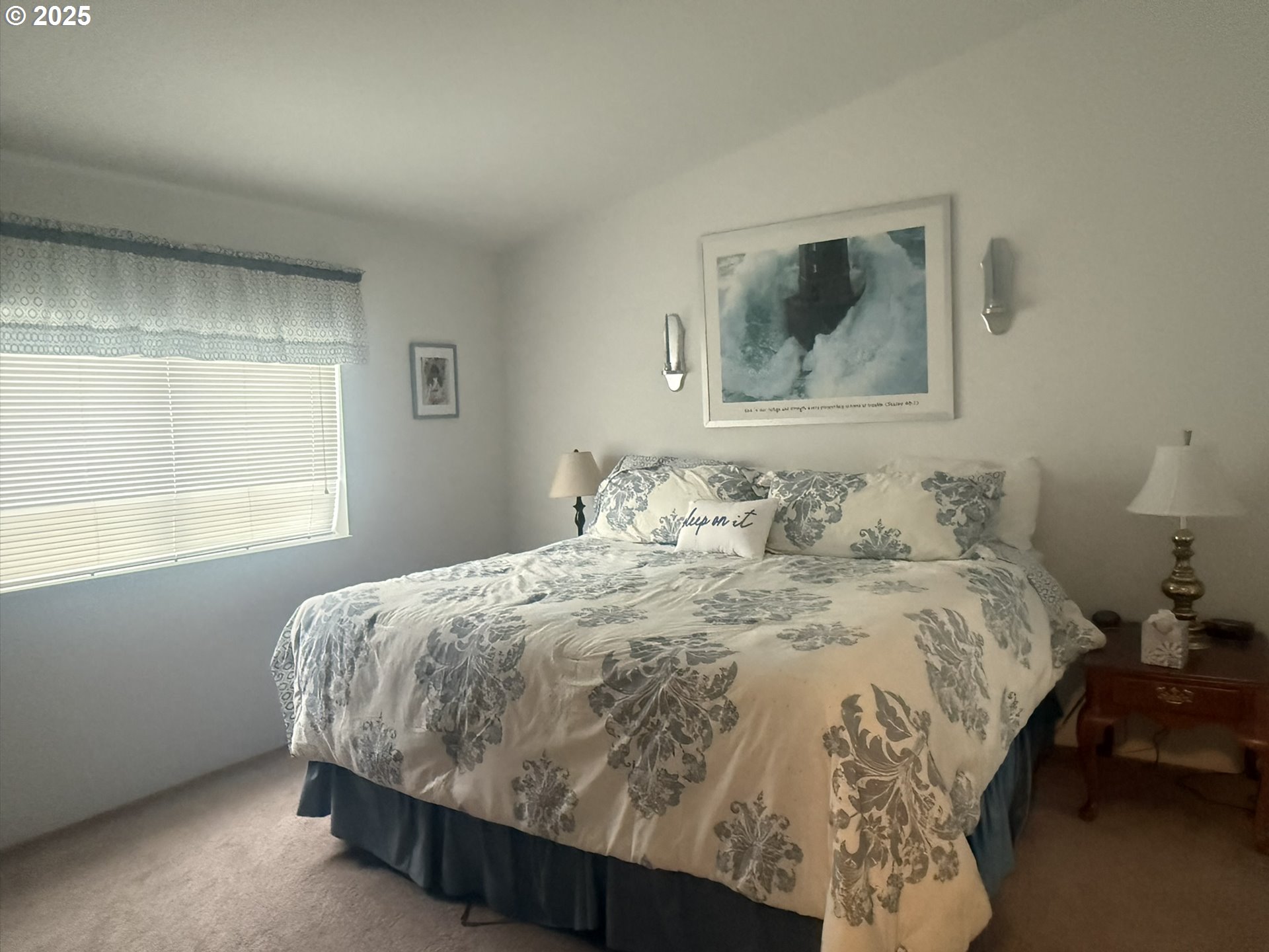 1601 Rhododendron Drive, Unit 654 Florence, OR 97439 - Photo 16 of 24 a bedroom with a bed and window