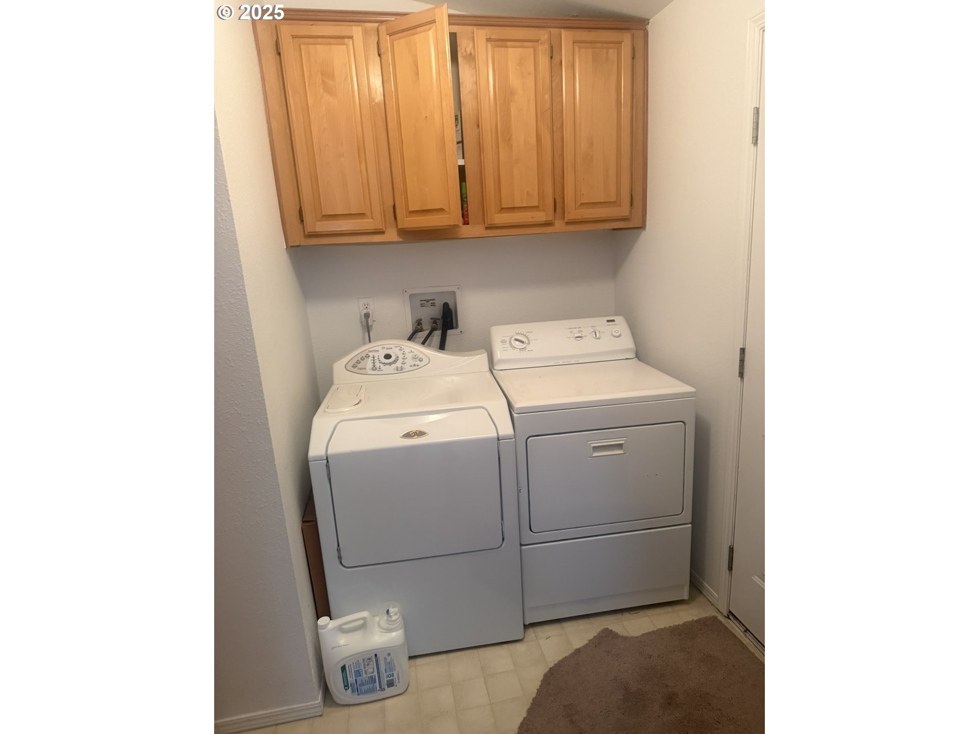 1601 Rhododendron Drive, Unit 654 Florence, OR 97439 - Photo 8 of 24 a utility room with dryer and washer