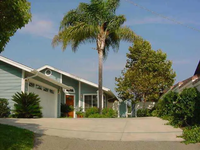 2336 Morro Road Fallbrook, CA 92028 - Photo 1 of 1 a front view of a house with a yard and garage
