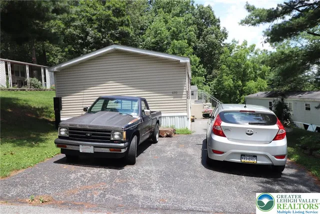 a car parked in front of a house