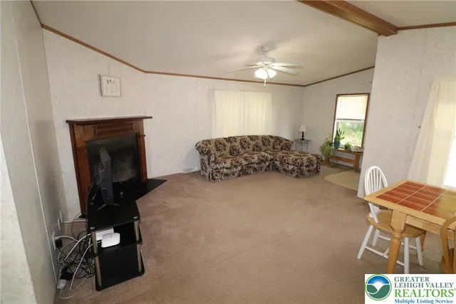 a bedroom with a bed and a mirror