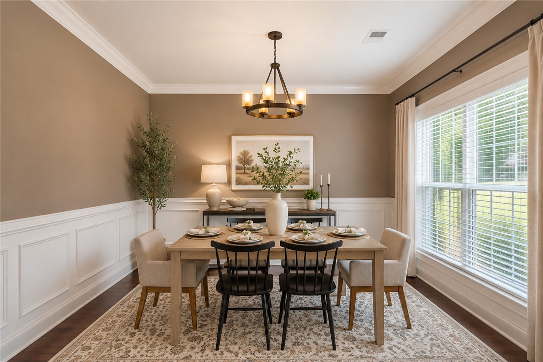 15 Fawn Hill Drive Anderson, SC 29621 - Photo 4 of 38 This refined dining room offers an elegant setting for memorable gatherings.