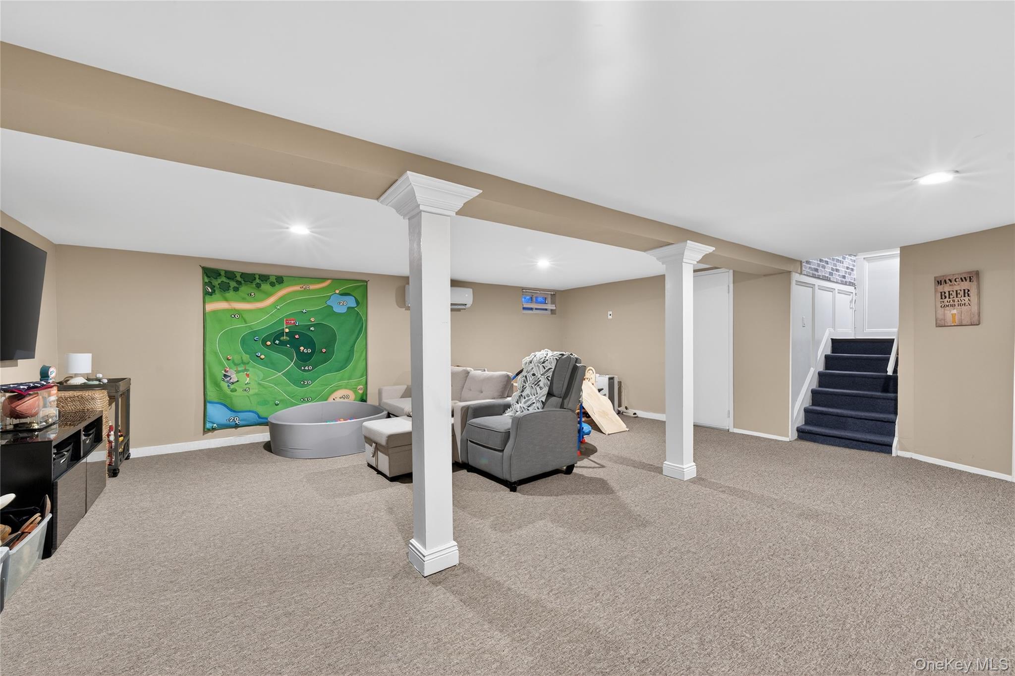 171 Melanie Way Commack, NY 11725 - Photo 21 of 29 Finished below grade area with recessed lighting and carpet