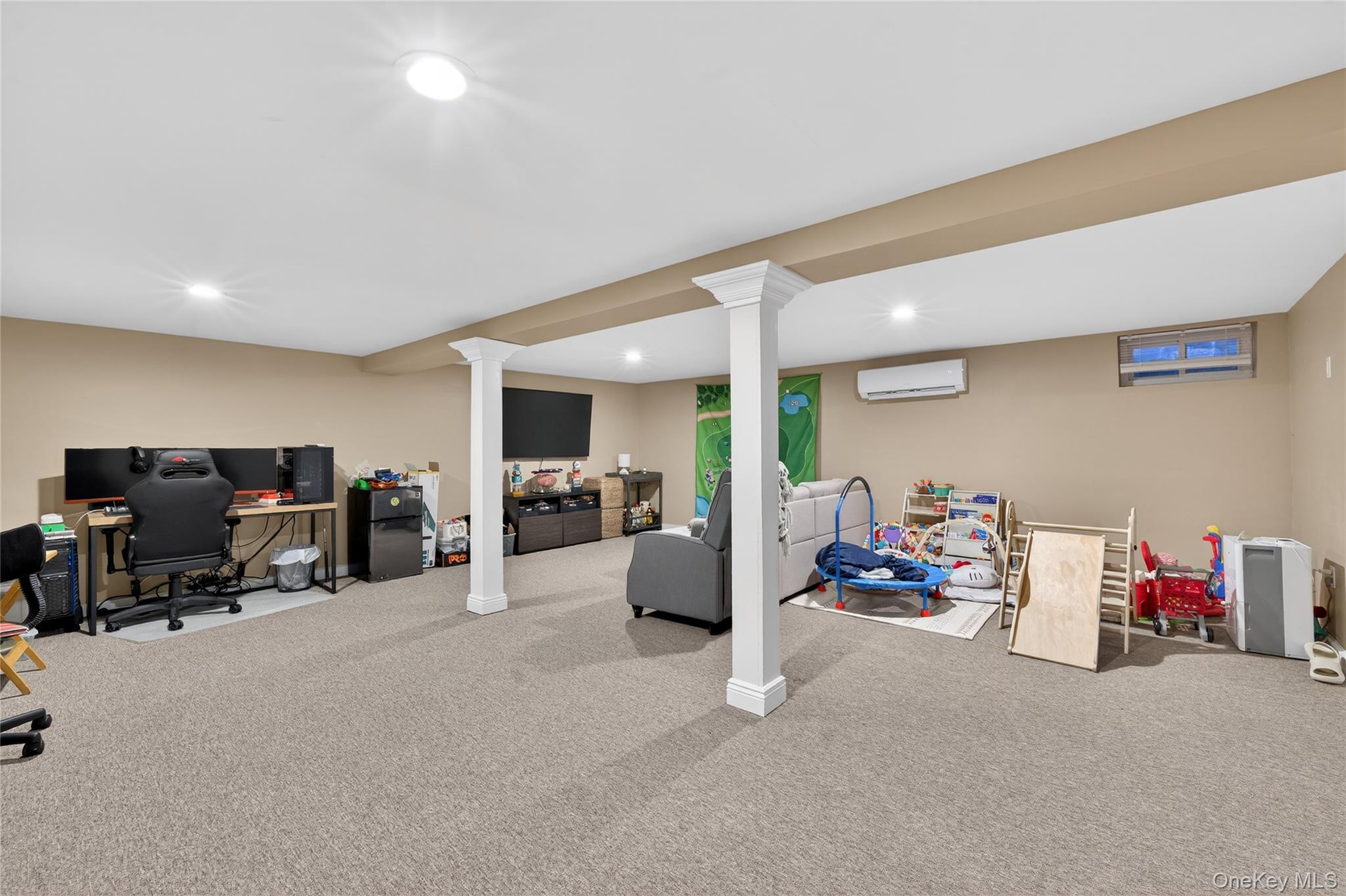 171 Melanie Way Commack, NY 11725 - Photo 22 of 29 Finished below grade area with recessed lighting and carpet