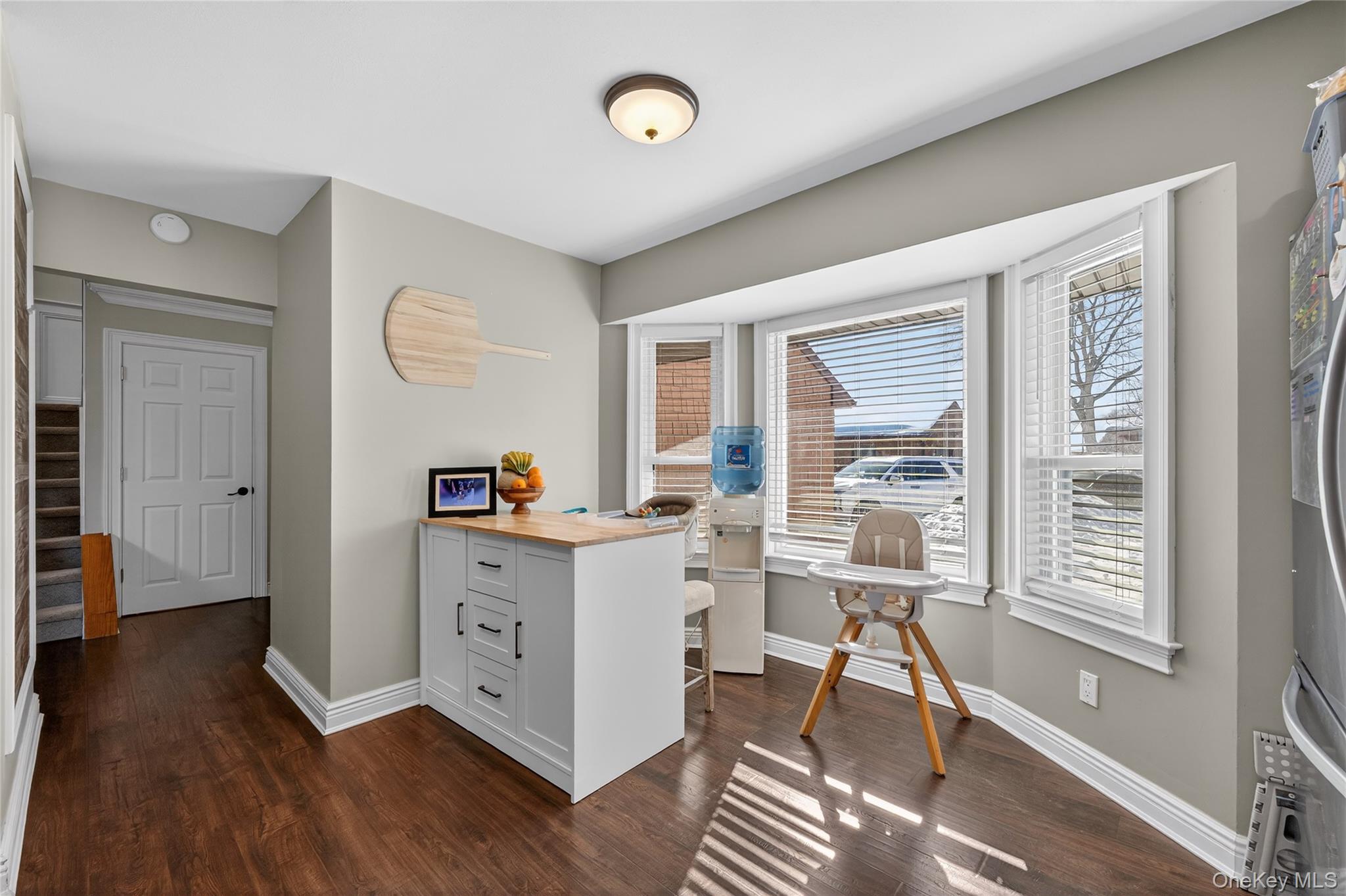 171 Melanie Way Commack, NY 11725 - Photo 8 of 29 Home office with dark wood-style flooring and baseboards