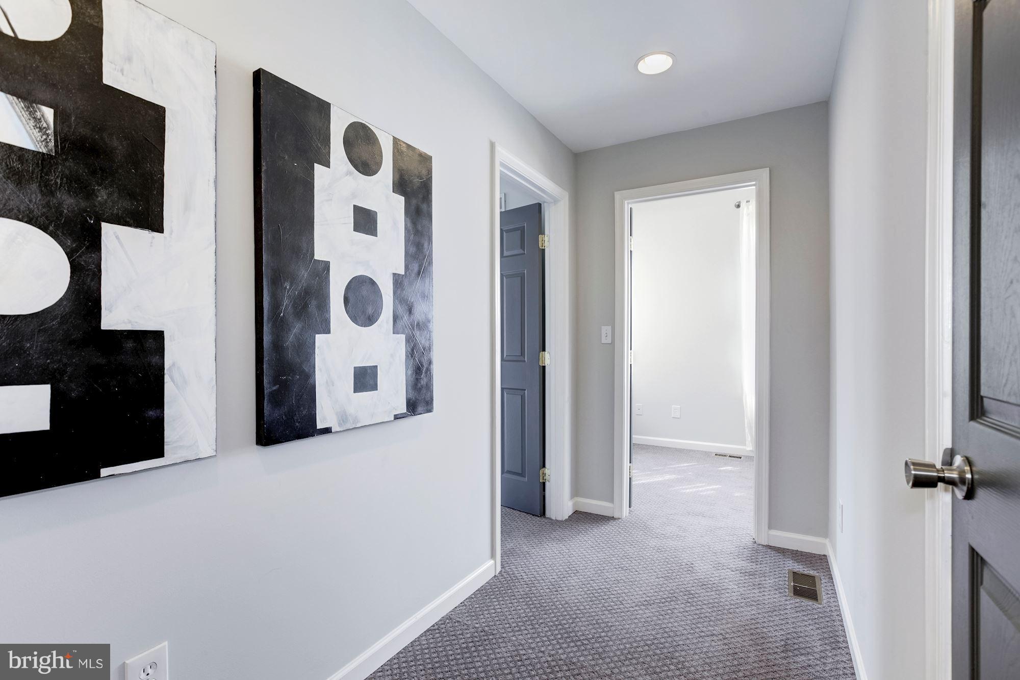 1377 K Street Southeast, Unit 2 Washington, DC 20003 - Photo 13 of 26 Upstairs hall to 2 BR and linen closet