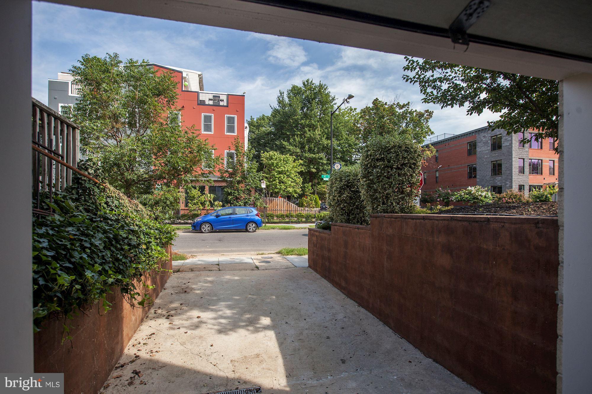 1377 K Street Southeast, Unit 2 Washington, DC 20003 - Photo 25 of 26 View from inside garage to K Street
