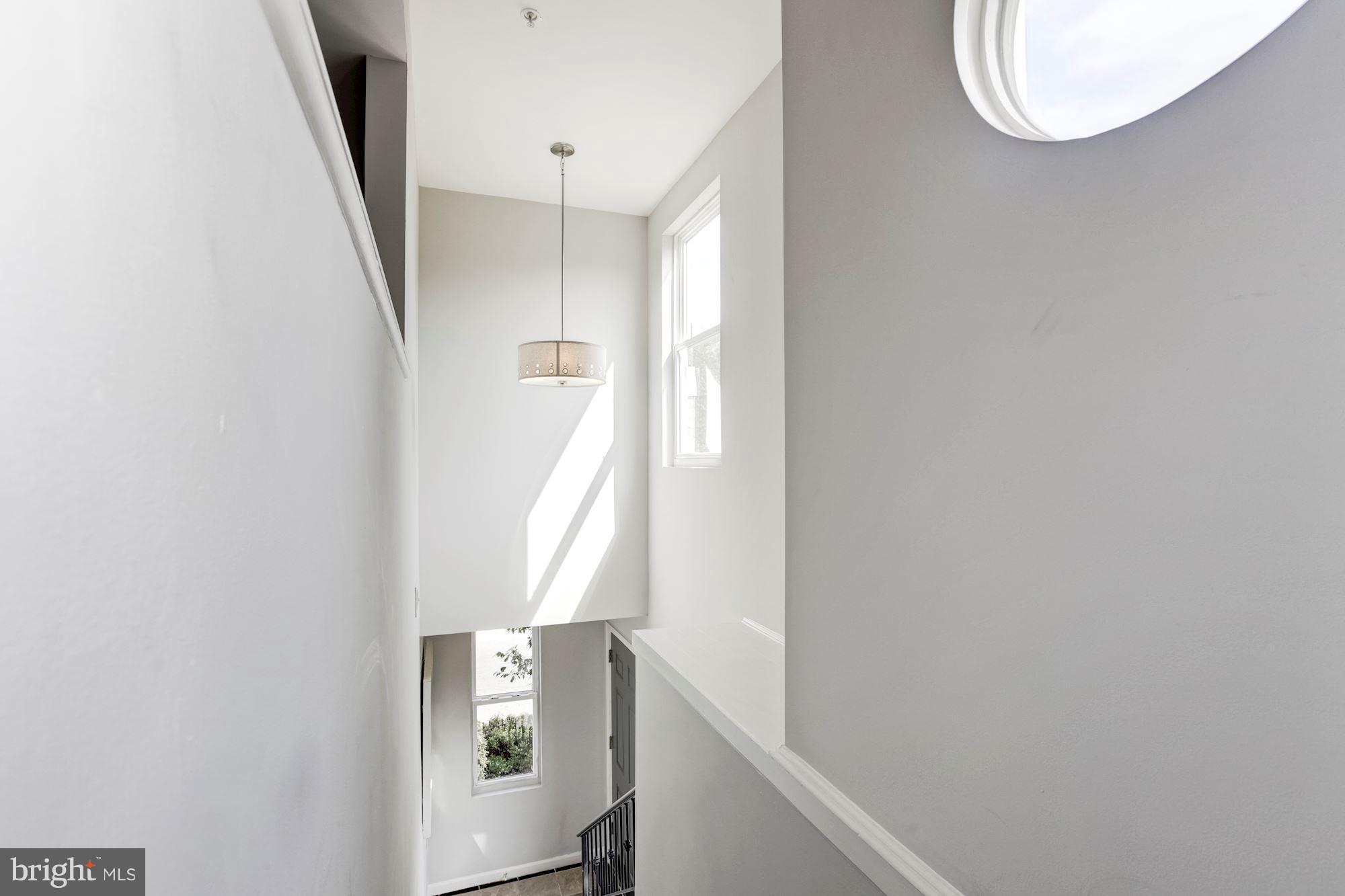 1377 K Street Southeast, Unit 2 Washington, DC 20003 - Photo 5 of 26 Vaulted entry staircase!
