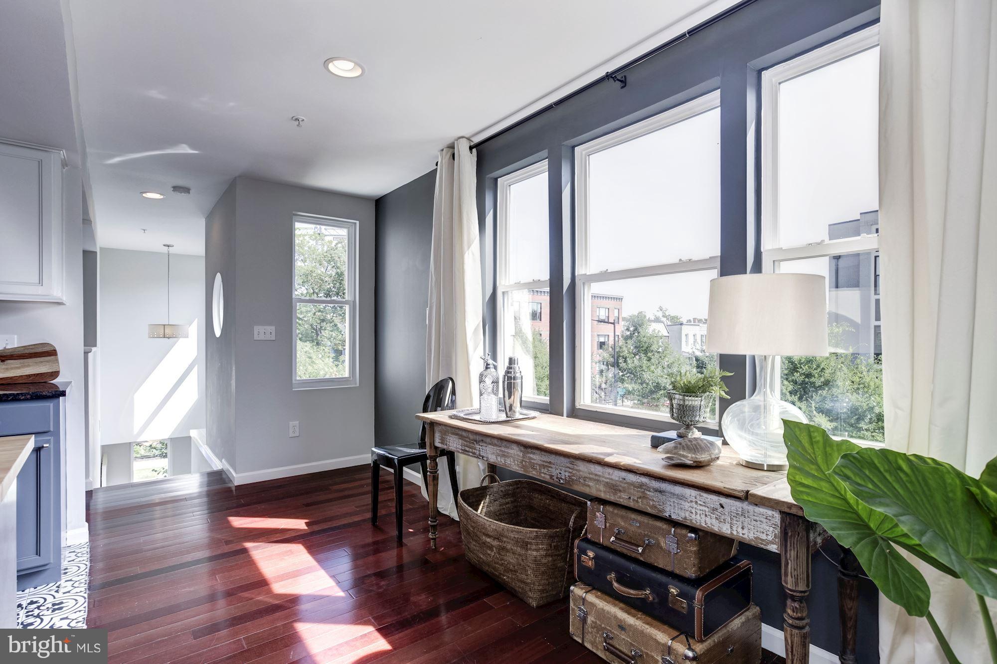 1377 K Street Southeast, Unit 2 Washington, DC 20003 - Photo 6 of 26 Entry landing opens to BA, living, kitchen, dining