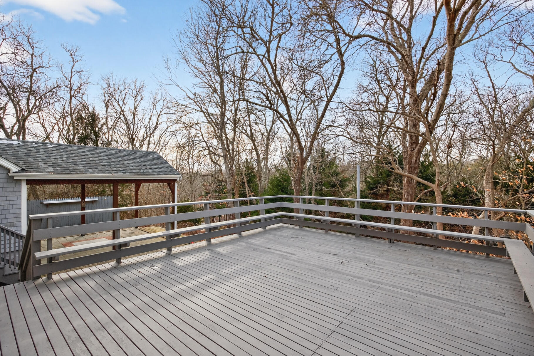 141 Braeside Road Falmouth, MA 02540 - Photo 34 of 47 a view of a terrace with trees