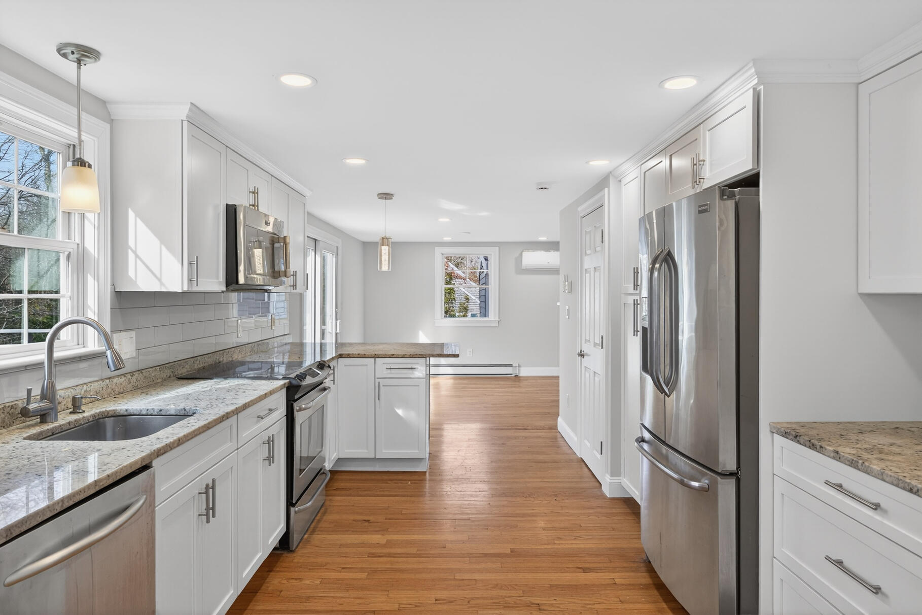 141 Braeside Road Falmouth, MA 02540 - Photo 8 of 47 a kitchen with a sink appliances and cabinets