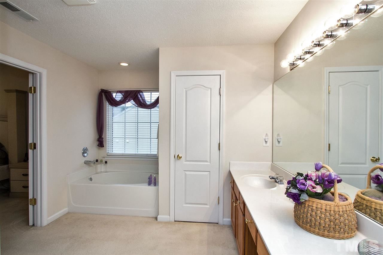 405 Grassy Point Road Apex, NC 27502 - Photo 17 of 25 Enjoy the garden tub to soak the day away ...