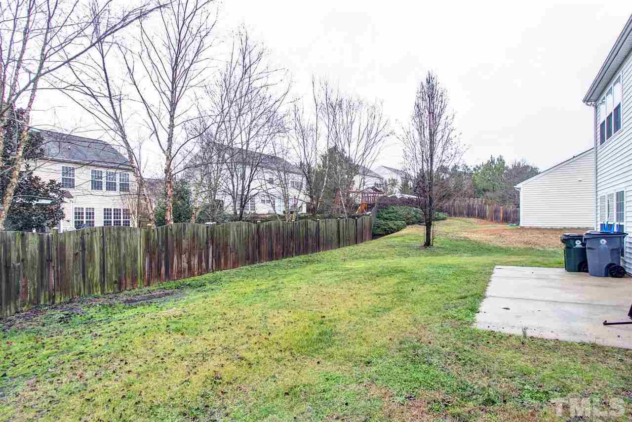 405 Grassy Point Road Apex, NC 27502 - Photo 24 of 25 Open and level lot ... nice area to have the family barbecue ...