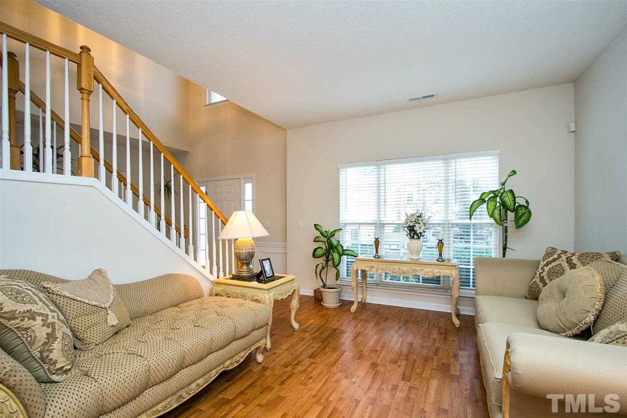 405 Grassy Point Road Apex, NC 27502 - Photo 6 of 25 This gorgeous room flows into the stunning Dining Room...